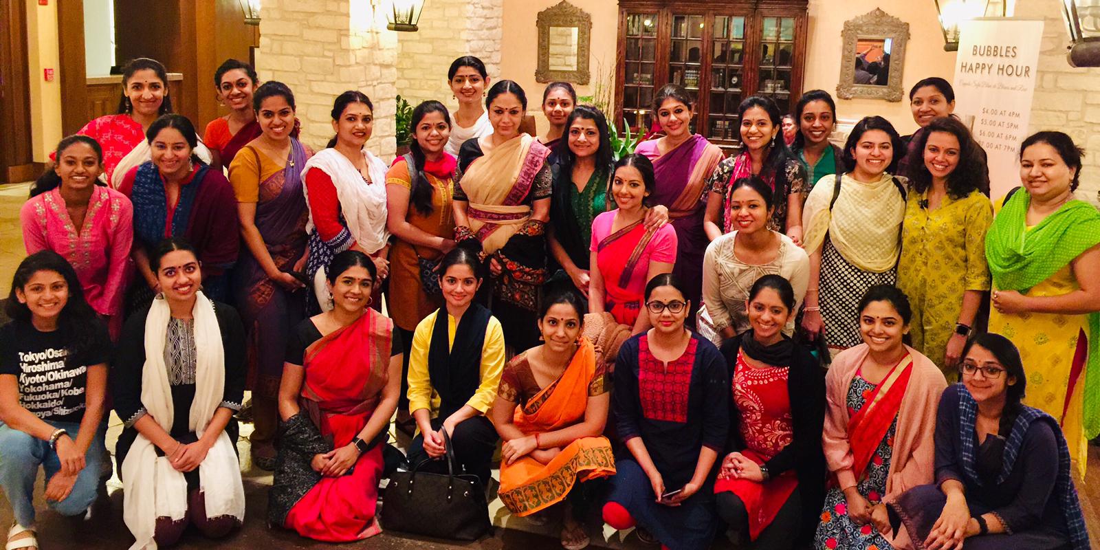 A large Tat Tvam Asi retreat cohort gathered together
